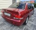 Червоний Міцубісі Lancer, об'ємом двигуна 1.6 л та пробігом 249 тис. км за 5200 $, фото 6 на Automoto.ua