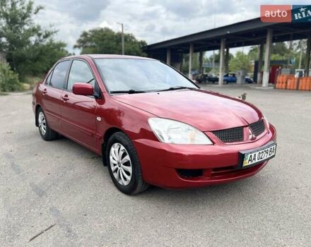 Красный Мицубиси Лансер, объемом двигателя 1.58 л и пробегом 250 тыс. км за 3999 $, фото 6 на Automoto.ua