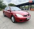Красный Мицубиси Лансер, объемом двигателя 1.58 л и пробегом 250 тыс. км за 3999 $, фото 6 на Automoto.ua