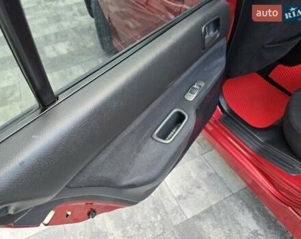 Червоний Міцубісі Lancer, об'ємом двигуна 1.6 л та пробігом 249 тис. км за 5200 $, фото 19 на Automoto.ua