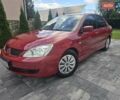 Червоний Міцубісі Lancer, об'ємом двигуна 1.6 л та пробігом 249 тис. км за 5200 $, фото 55 на Automoto.ua