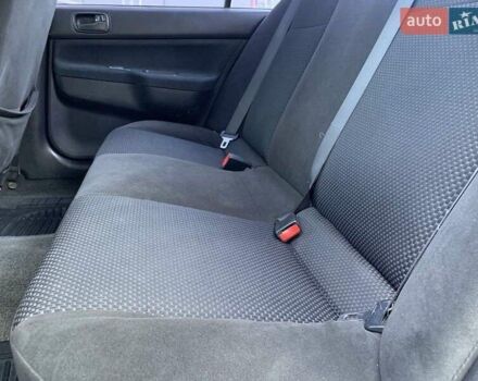 Красный Мицубиси Лансер, объемом двигателя 1.58 л и пробегом 250 тыс. км за 3999 $, фото 19 на Automoto.ua