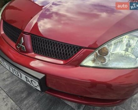 Червоний Міцубісі Lancer, об'ємом двигуна 1.6 л та пробігом 249 тис. км за 5200 $, фото 39 на Automoto.ua
