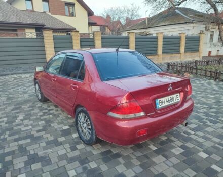 Червоний Міцубісі Lancer, об'ємом двигуна 1.6 л та пробігом 280 тис. км за 3500 $, фото 7 на Automoto.ua