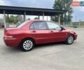 Красный Мицубиси Лансер, объемом двигателя 1.58 л и пробегом 250 тыс. км за 3999 $, фото 10 на Automoto.ua