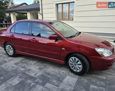 Червоний Міцубісі Lancer, об'ємом двигуна 1.6 л та пробігом 249 тис. км за 5200 $, фото 2 на Automoto.ua