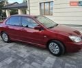 Червоний Міцубісі Lancer, об'ємом двигуна 1.6 л та пробігом 249 тис. км за 5200 $, фото 2 на Automoto.ua