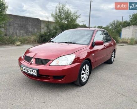 Красный Мицубиси Лансер, объемом двигателя 1.58 л и пробегом 250 тыс. км за 3999 $, фото 8 на Automoto.ua