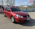 Червоний Міцубісі Lancer, об'ємом двигуна 1.6 л та пробігом 217 тис. км за 4600 $, фото 6 на Automoto.ua