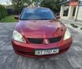 Червоний Міцубісі Lancer, об'ємом двигуна 1.6 л та пробігом 249 тис. км за 5200 $, фото 7 на Automoto.ua