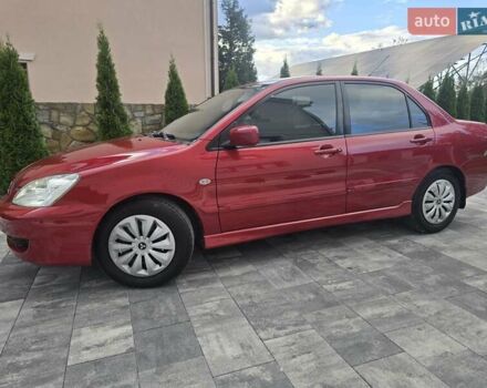 Червоний Міцубісі Lancer, об'ємом двигуна 1.6 л та пробігом 249 тис. км за 5200 $, фото 56 на Automoto.ua