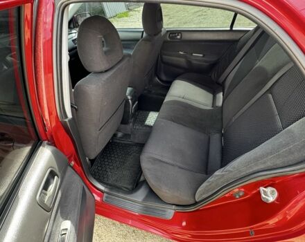 Червоний Міцубісі Lancer, об'ємом двигуна 1.6 л та пробігом 250 тис. км за 4050 $, фото 14 на Automoto.ua