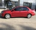 Червоний Міцубісі Lancer, об'ємом двигуна 2 л та пробігом 214 тис. км за 5400 $, фото 3 на Automoto.ua