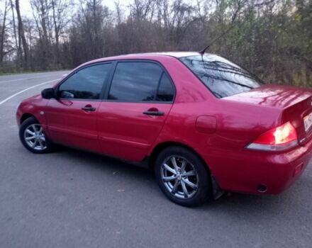 Красный Мицубиси Лансер, объемом двигателя 1.6 л и пробегом 450 тыс. км за 2850 $, фото 3 на Automoto.ua