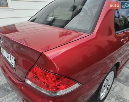 Червоний Міцубісі Lancer, об'ємом двигуна 1.6 л та пробігом 249 тис. км за 5200 $, фото 45 на Automoto.ua