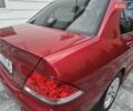 Червоний Міцубісі Lancer, об'ємом двигуна 1.6 л та пробігом 249 тис. км за 5200 $, фото 45 на Automoto.ua