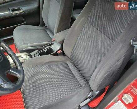 Червоний Міцубісі Lancer, об'ємом двигуна 1.6 л та пробігом 249 тис. км за 5200 $, фото 13 на Automoto.ua