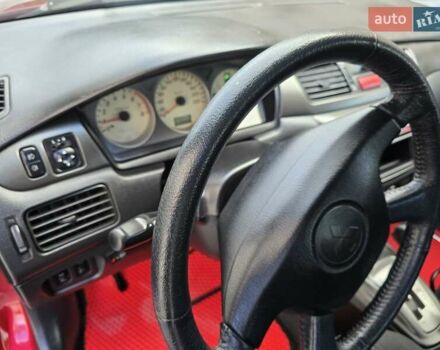 Червоний Міцубісі Lancer, об'ємом двигуна 1.6 л та пробігом 249 тис. км за 5200 $, фото 12 на Automoto.ua