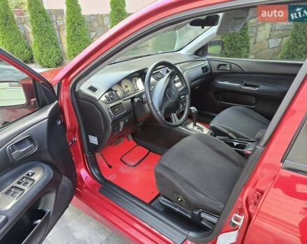 Червоний Міцубісі Lancer, об'ємом двигуна 1.6 л та пробігом 249 тис. км за 5200 $, фото 11 на Automoto.ua