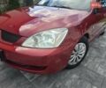 Червоний Міцубісі Lancer, об'ємом двигуна 1.6 л та пробігом 249 тис. км за 5200 $, фото 32 на Automoto.ua