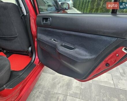 Червоний Міцубісі Lancer, об'ємом двигуна 1.6 л та пробігом 249 тис. км за 5200 $, фото 28 на Automoto.ua