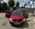 Червоний Міцубісі Lancer, об'ємом двигуна 1.6 л та пробігом 250 тис. км за 4050 $, фото 9 на Automoto.ua