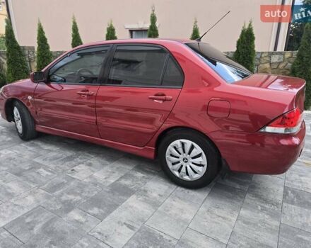 Червоний Міцубісі Lancer, об'ємом двигуна 1.6 л та пробігом 249 тис. км за 5200 $, фото 57 на Automoto.ua