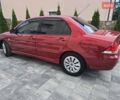 Червоний Міцубісі Lancer, об'ємом двигуна 1.6 л та пробігом 249 тис. км за 5200 $, фото 57 на Automoto.ua