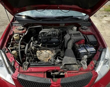 Червоний Міцубісі Lancer, об'ємом двигуна 1.6 л та пробігом 250 тис. км за 4050 $, фото 15 на Automoto.ua