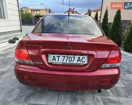 Червоний Міцубісі Lancer, об'ємом двигуна 1.6 л та пробігом 249 тис. км за 5200 $, фото 1 на Automoto.ua