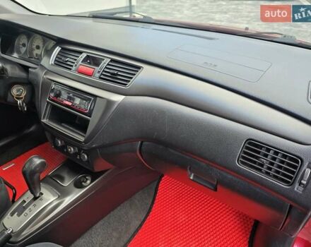 Червоний Міцубісі Lancer, об'ємом двигуна 1.6 л та пробігом 249 тис. км за 5200 $, фото 17 на Automoto.ua