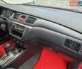 Червоний Міцубісі Lancer, об'ємом двигуна 1.6 л та пробігом 249 тис. км за 5200 $, фото 17 на Automoto.ua
