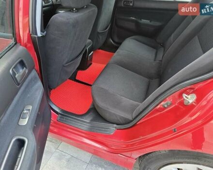 Червоний Міцубісі Lancer, об'ємом двигуна 1.6 л та пробігом 249 тис. км за 5200 $, фото 25 на Automoto.ua