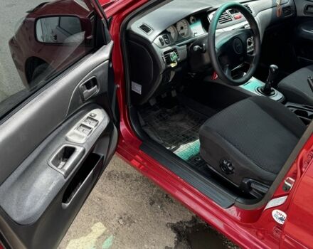 Червоний Міцубісі Lancer, об'ємом двигуна 1.6 л та пробігом 250 тис. км за 4050 $, фото 12 на Automoto.ua