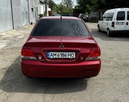 Червоний Міцубісі Lancer, об'ємом двигуна 1.6 л та пробігом 250 тис. км за 4050 $, фото 5 на Automoto.ua