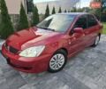 Червоний Міцубісі Lancer, об'ємом двигуна 1.6 л та пробігом 249 тис. км за 5200 $, фото 1 на Automoto.ua