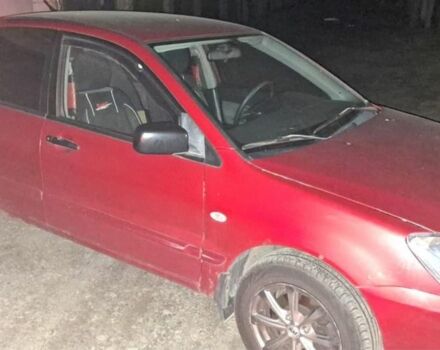 Мицубиси Лансер 2005 в Броварах на Automoto.ua Красный Мицубиси Лансер, объемом двигателя 1.6 л и пробегом 280 тыс. км за 2990 $, фото 2 на Automoto.ua