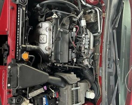 Красный Мицубиси Лансер, объемом двигателя 1.58 л и пробегом 250 тыс. км за 3999 $, фото 17 на Automoto.ua