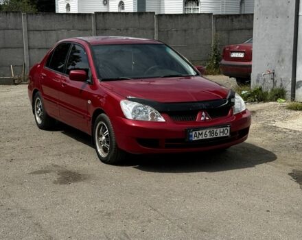 Червоний Міцубісі Lancer, об'ємом двигуна 1.6 л та пробігом 250 тис. км за 4050 $, фото 8 на Automoto.ua