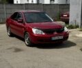 Червоний Міцубісі Lancer, об'ємом двигуна 1.6 л та пробігом 250 тис. км за 4050 $, фото 8 на Automoto.ua