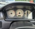 Червоний Міцубісі Lancer, об'ємом двигуна 1.6 л та пробігом 249 тис. км за 5200 $, фото 14 на Automoto.ua