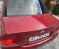 Червоний Міцубісі Lancer, об'ємом двигуна 1.6 л та пробігом 249 тис. км за 5200 $, фото 43 на Automoto.ua
