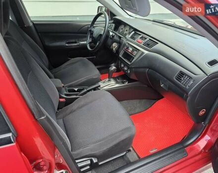 Червоний Міцубісі Lancer, об'ємом двигуна 1.6 л та пробігом 249 тис. км за 5200 $, фото 20 на Automoto.ua