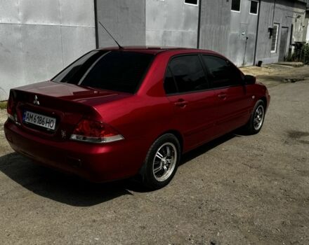 Червоний Міцубісі Lancer, об'ємом двигуна 1.6 л та пробігом 250 тис. км за 4050 $, фото 3 на Automoto.ua