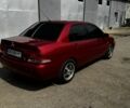 Червоний Міцубісі Lancer, об'ємом двигуна 1.6 л та пробігом 250 тис. км за 4050 $, фото 3 на Automoto.ua