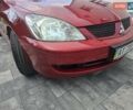 Червоний Міцубісі Lancer, об'ємом двигуна 1.6 л та пробігом 249 тис. км за 5200 $, фото 51 на Automoto.ua