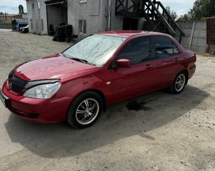 Червоний Міцубісі Lancer, об'ємом двигуна 1.6 л та пробігом 250 тис. км за 4050 $, фото 1 на Automoto.ua
