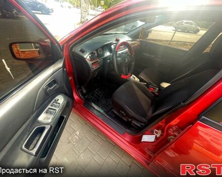 Червоний Міцубісі Lancer, об'ємом двигуна 1.6 л та пробігом 290 тис. км за 4250 $, фото 4 на Automoto.ua