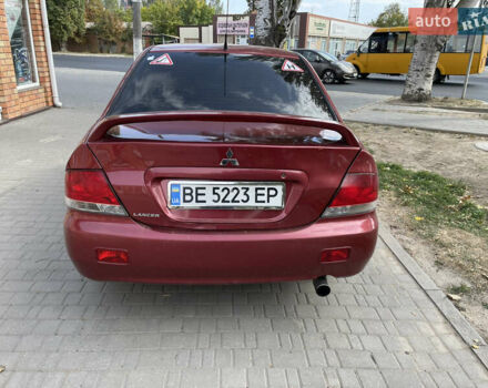 Червоний Міцубісі Lancer, об'ємом двигуна 1.58 л та пробігом 290 тис. км за 4250 $, фото 7 на Automoto.ua