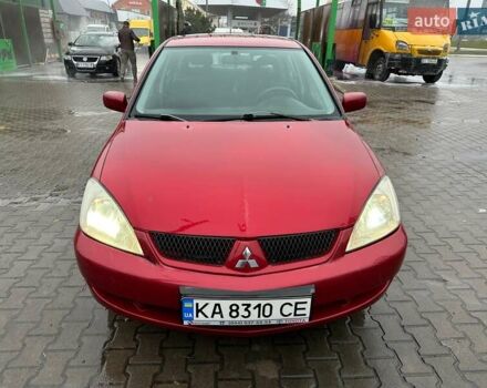 Красный Мицубиси Лансер, объемом двигателя 1.6 л и пробегом 185 тыс. км за 5000 $, фото 16 на Automoto.ua